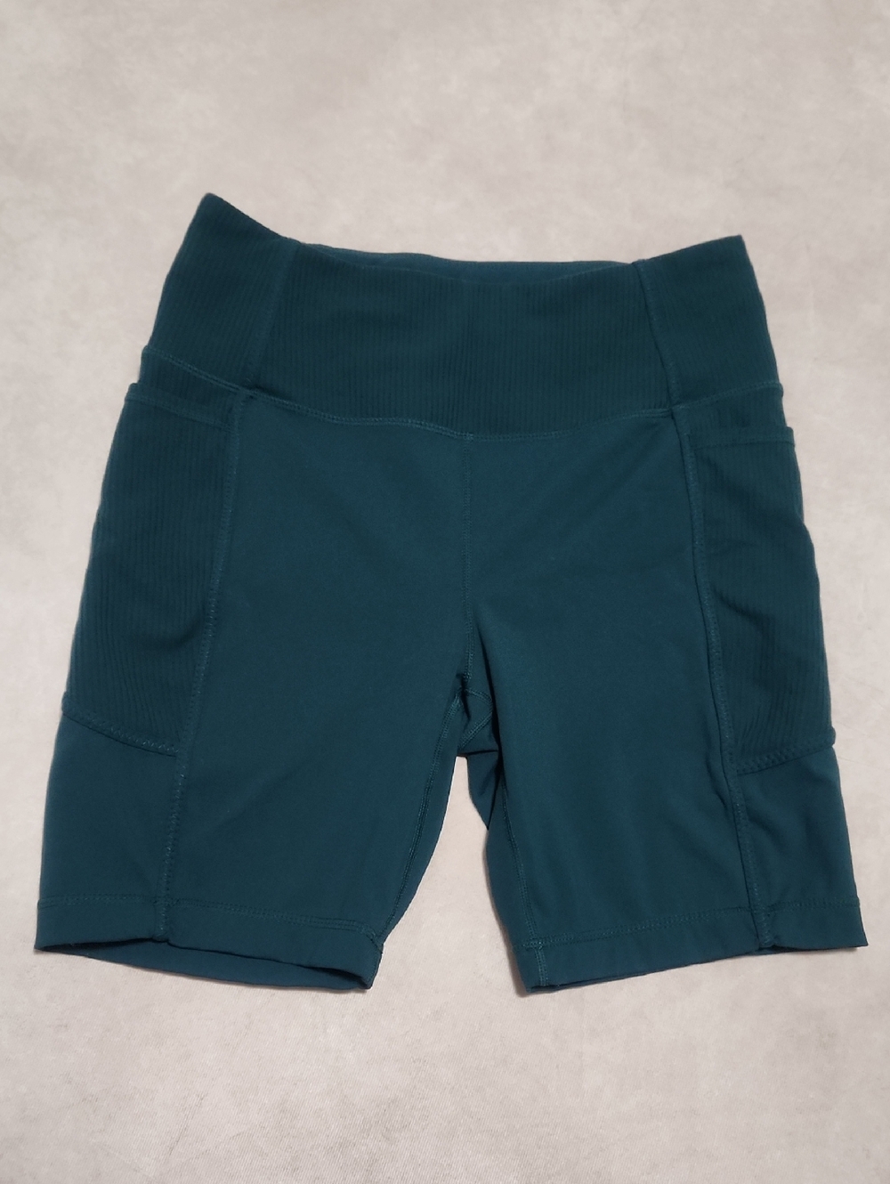 Mondetta Deep Green High-Rise Bike Shorts with Side Pockets